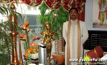 Karthik in an Indian sherwani